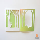 Folding rabbit greeting card - fantasy bunny forest