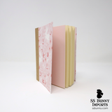 Pink hopping bunny with flowers blank journal