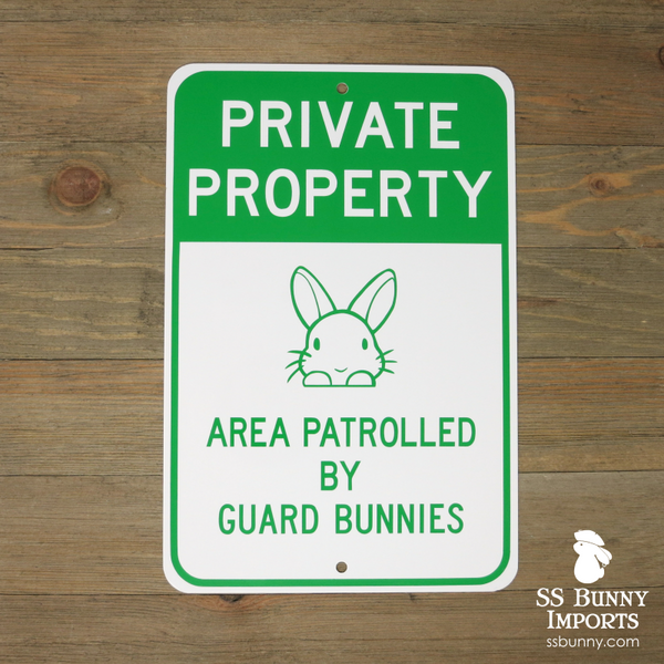 Private Property, Area Patrolled by Guard Bunnies sign -- green, peeking