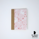 Pink hopping bunny with flowers blank journal
