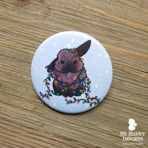 Tort half lop with holiday lights pinback button